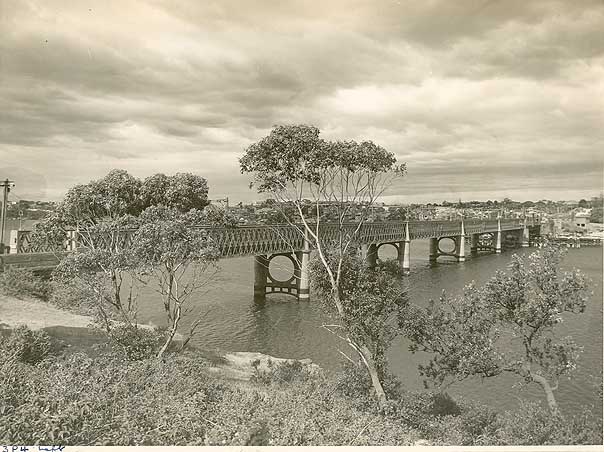 The (old) Gladesville Bridge opened in 1881. It was replaced by a new arch bridge in 1964. Digital ID 12932-a012-a012X2443000143