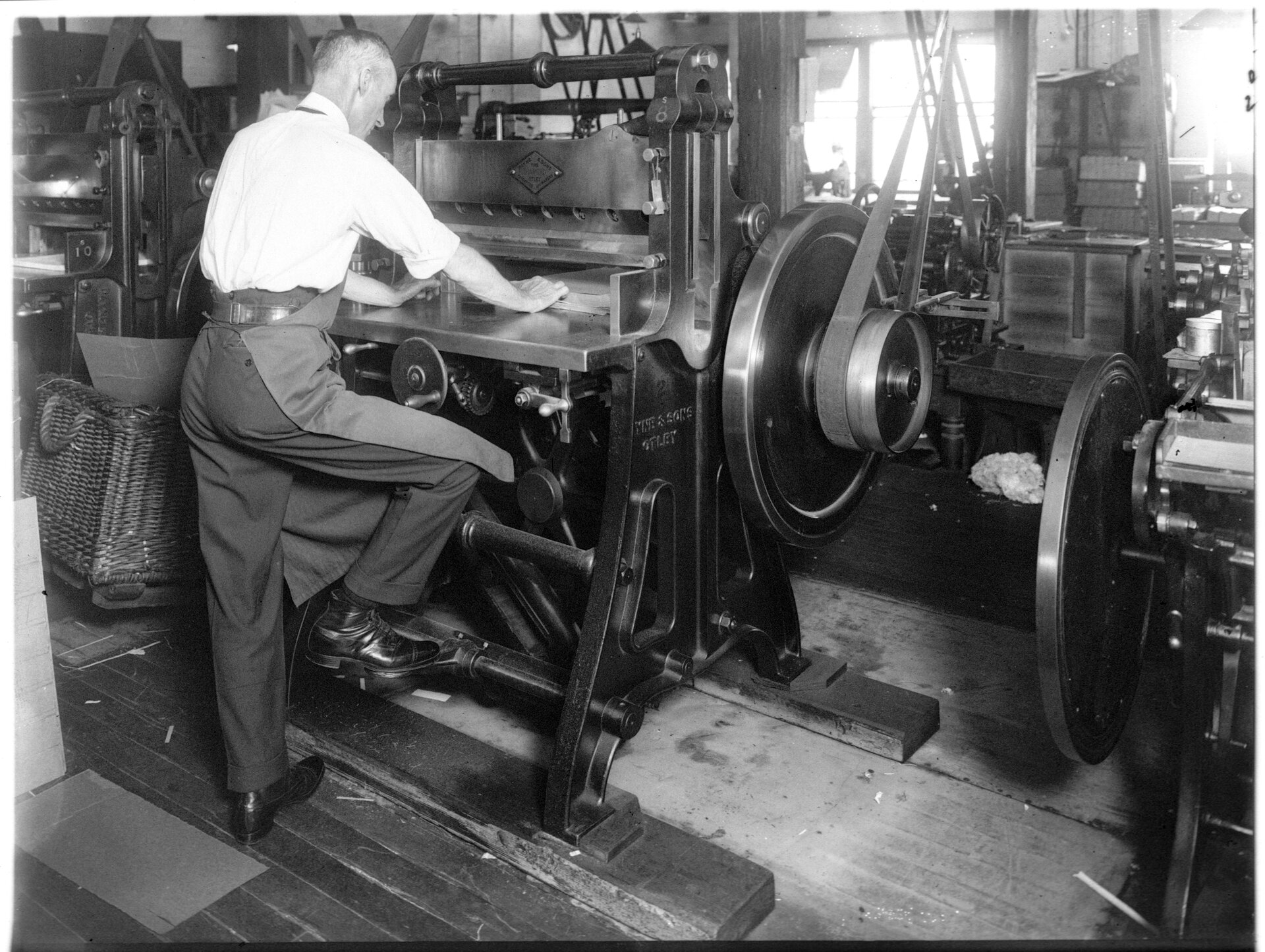 Cutting machine, Revenue Room, GPO Liverpool Street, Sydney 1928. NRS-4481-3-[7/16004]-St12197