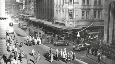 Trams operating at the intersection of Barrack George Streets, Sydney showing the David Jones store, 1950. Digital ID 17420_a014_a0140001151