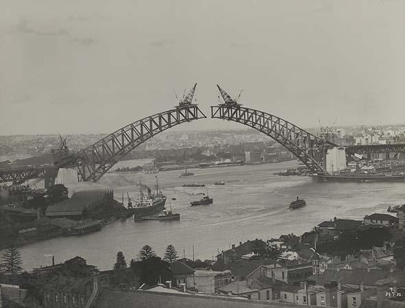 Sydney Harbour Bridge - view of two halves from the Church of England Grammar School, 29 Jul 1930. Digital ID 2685_a007_a00704_8729000194r 